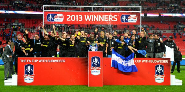 Wigan lift the FA Cup before being relegated